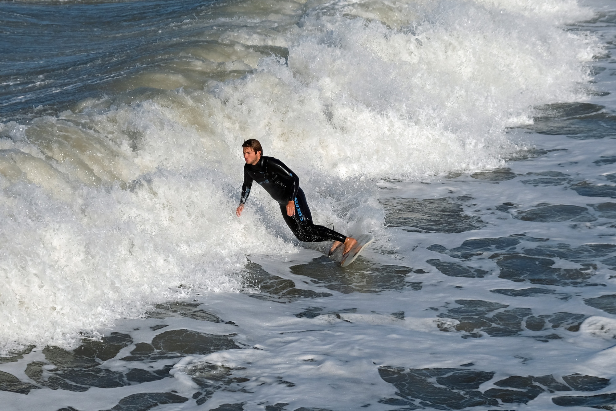 A surfer in Lido di Camaiore
