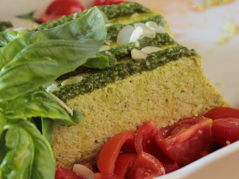 Courgette flan with basil sauce and fresh tomatoes by Arturo Dori