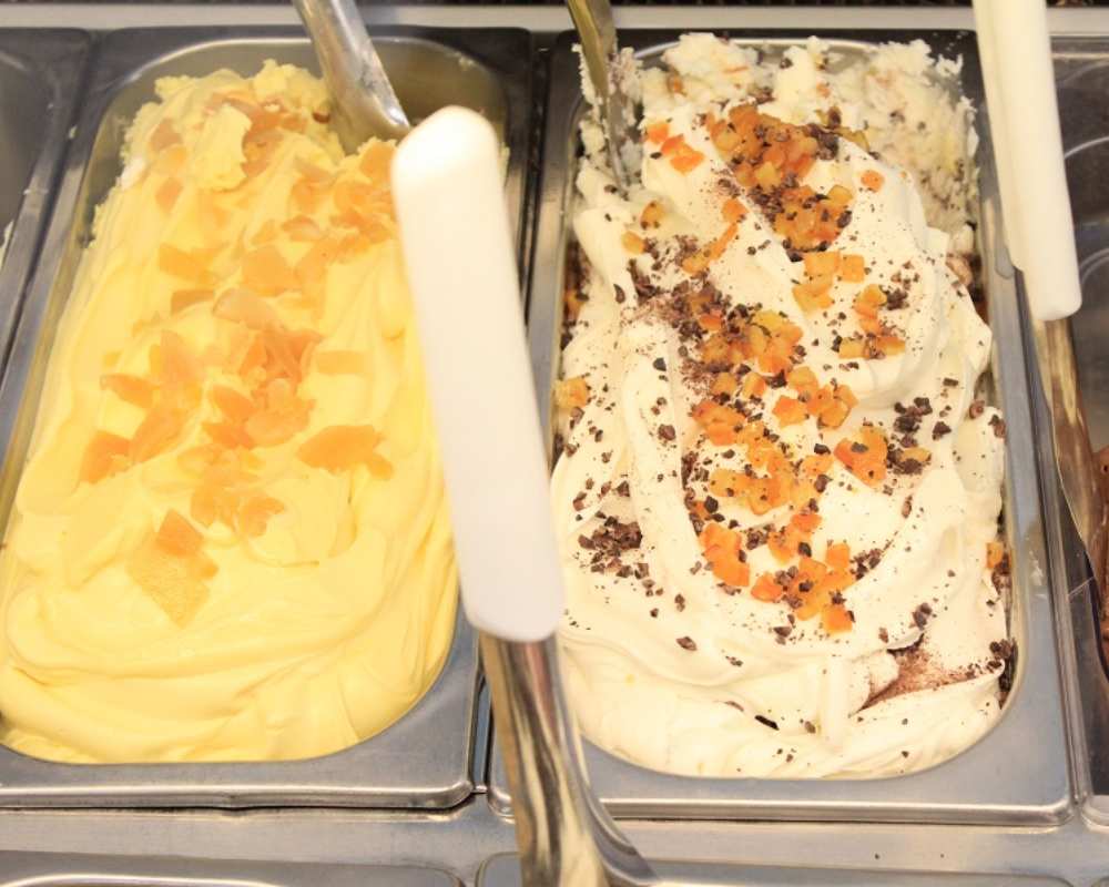 On your right one of the specialties at Gelateria il Triangolo delle Bermuda: sheep ricotta cheese, oranges, honey and cocoa beans