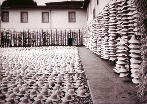 A stock of finished straw hats