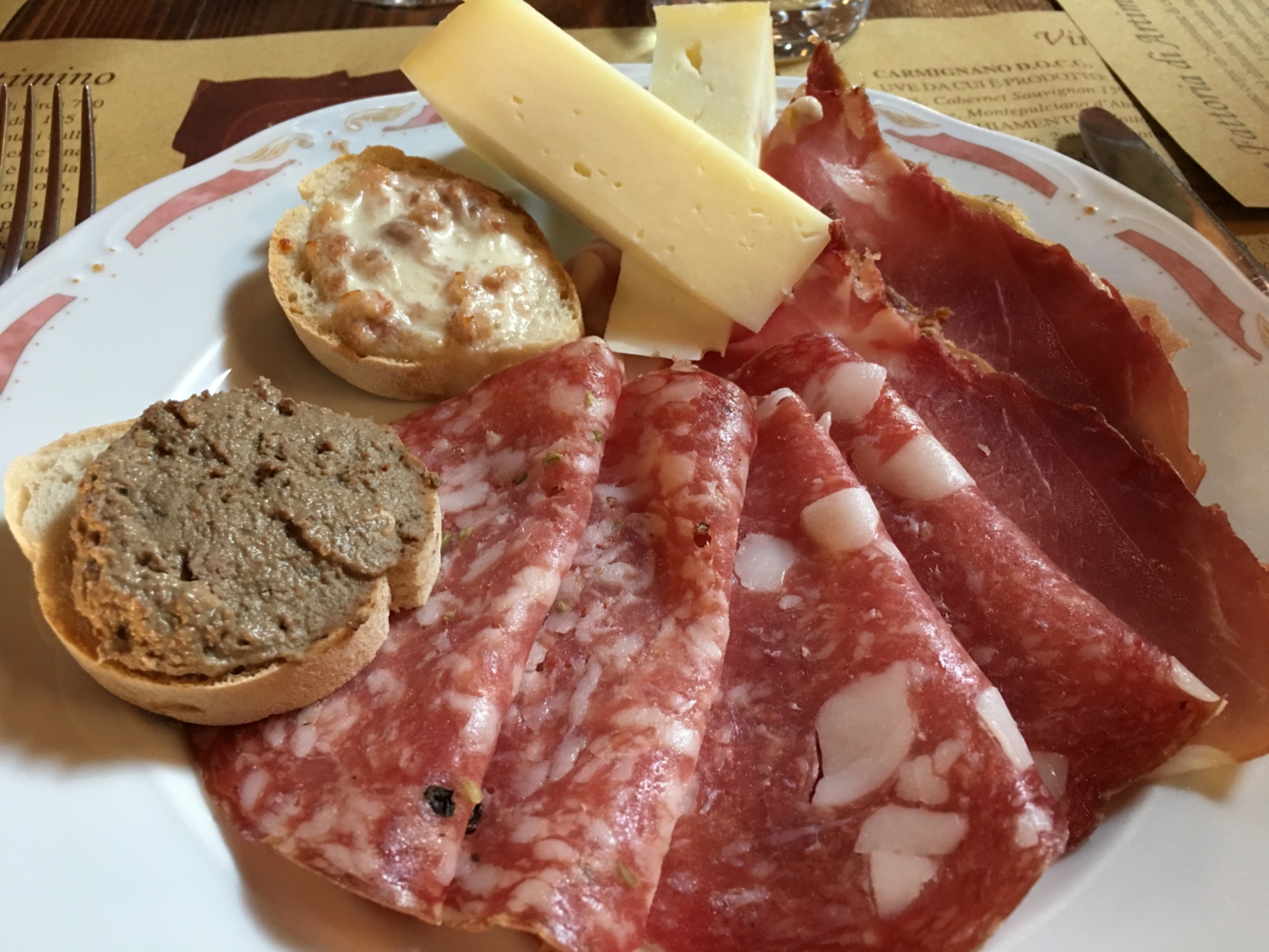 Appetizer with crostini and tuscan salami