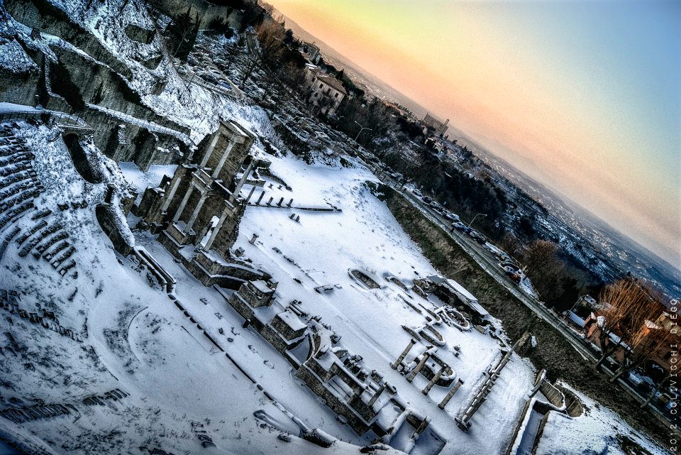 Volterra roman theatre covered in snow